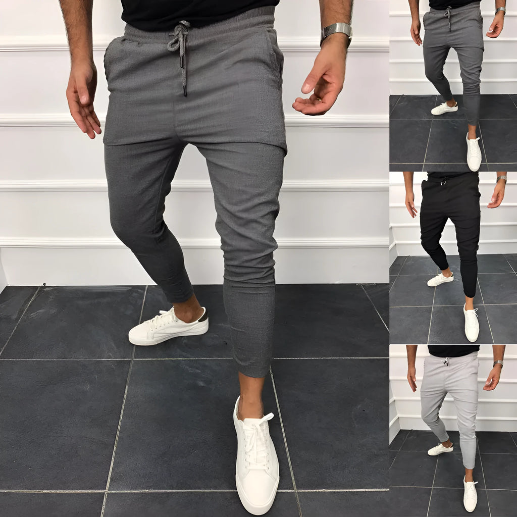 Lace-up casual jogging pants in solid light grey, nine points length, mid-waist, with adjustable front laces