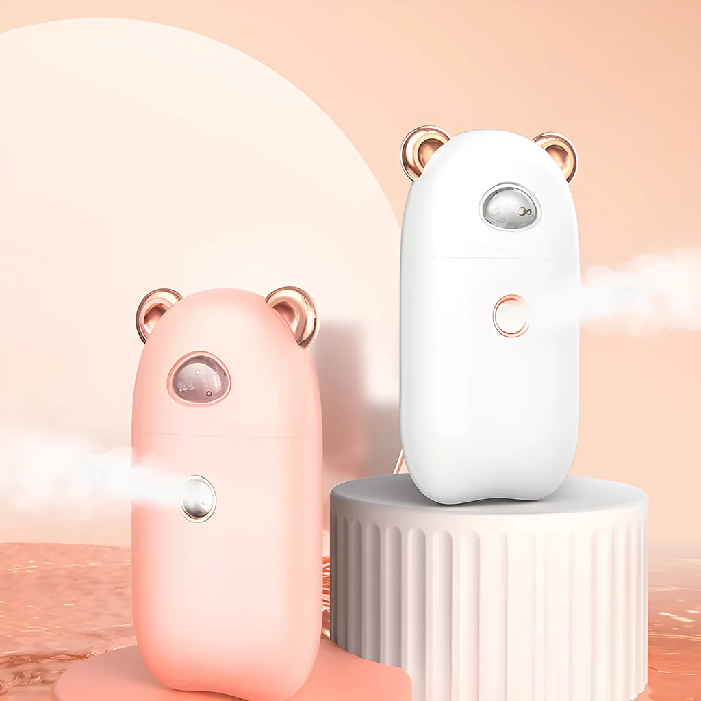USB rechargeable portable hand humidifier and face steamer in white with cold spray mist