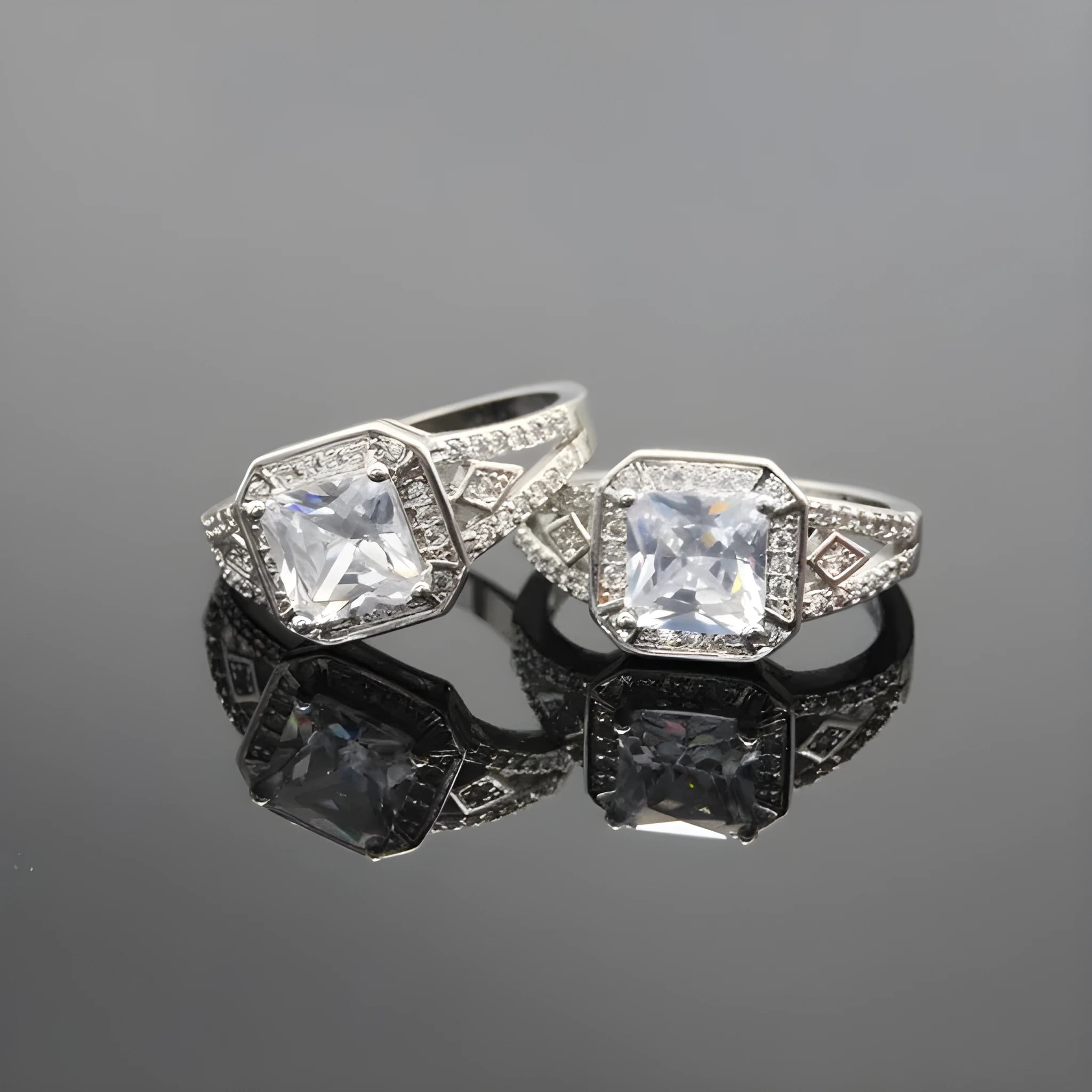 Women's geometric zircon ring with platinum finish on a copper band, showing hollow construction and quadrilateral design.