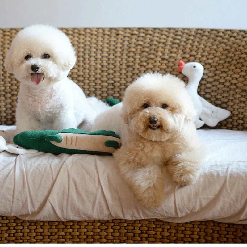 Green plush dog toy measuring 35cm long with soft fabric construction