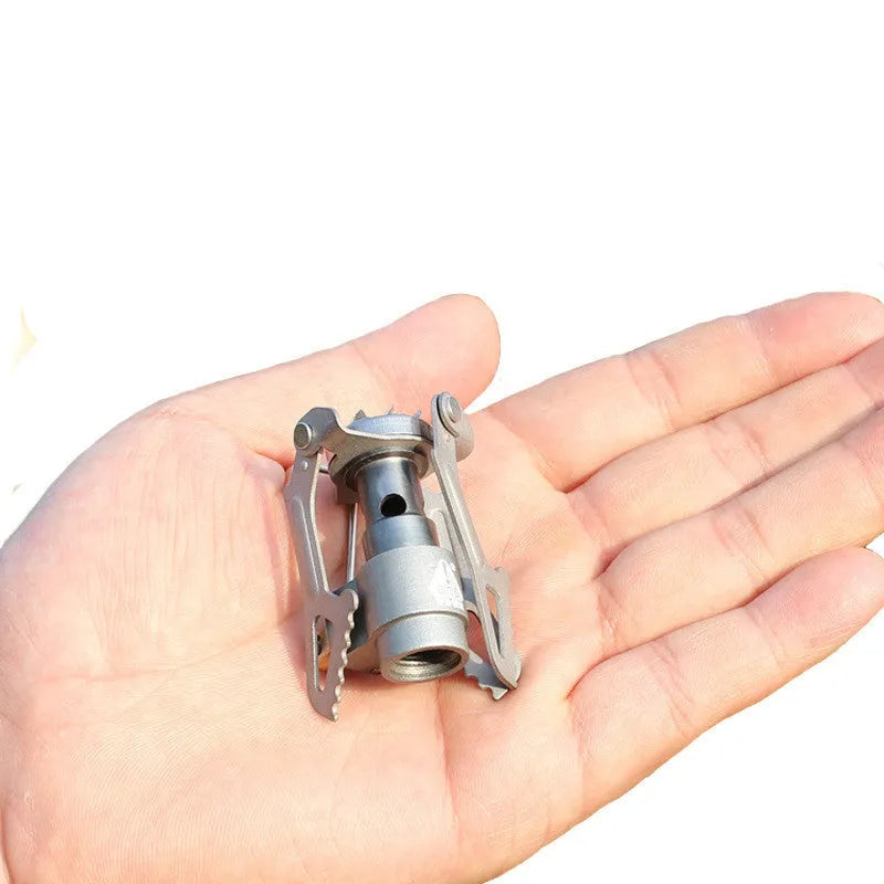 Portable camping gas stove with one-piece metal furnace for outdoor cooking