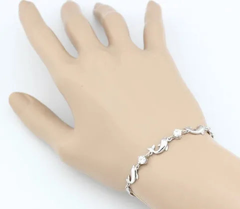 925 sterling silver heart-shaped bracelet with inlaid diamond style, available in purple and white on wrist