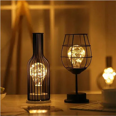 Decorative wrought iron table lamp in wine bottle shape with warm white LED lighting