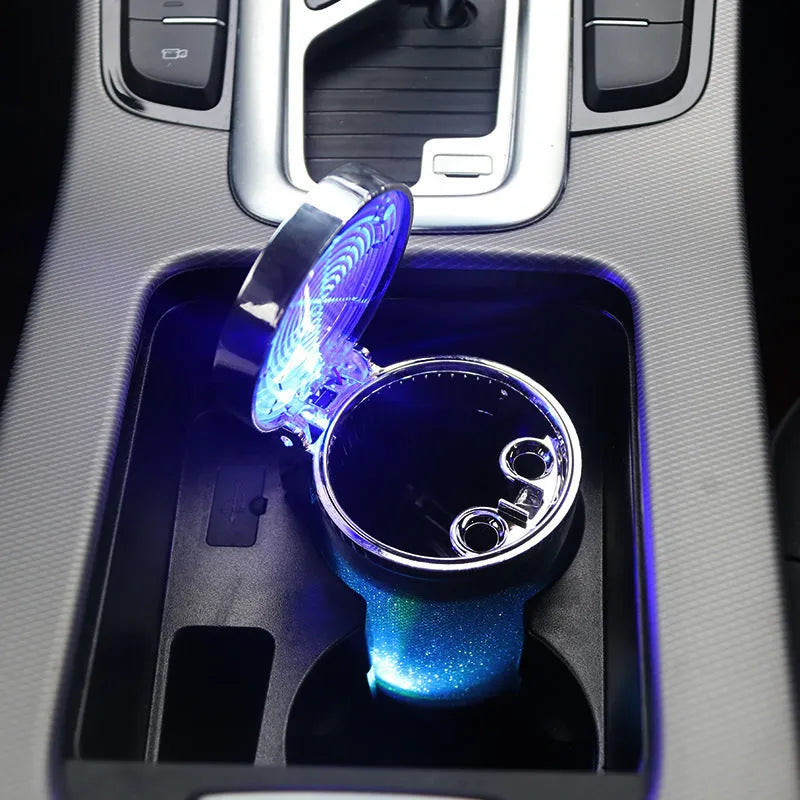 Silver ABS car ashtray with RGB LED lights, lid closed, compact 10x8x6cm