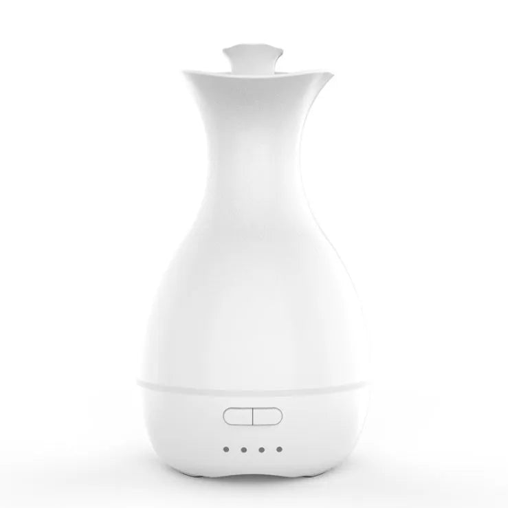 White ultrasonic aromatherapy diffuser with colourful LED night light and 200ml water tank capacity