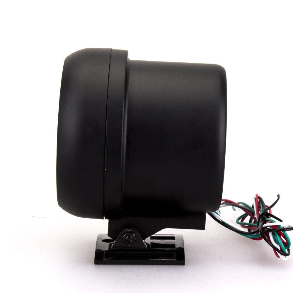 Black plastic automotive tachometer with blue-lit dial showing 0-8000 RPM scale.