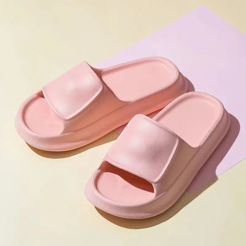 A pair of thick-soled EVA foam flip-flop slippers in a choice of seven colours on a plain background.