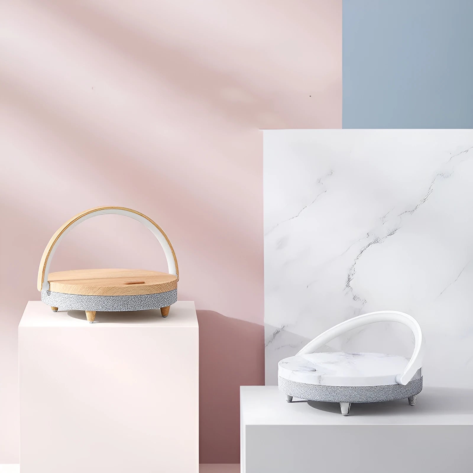 Wireless charging LED night light with Bluetooth speaker in marble pattern finish on a wooden table.