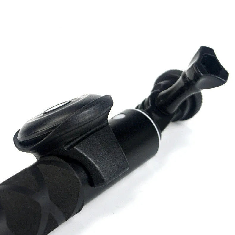 Black Bluetooth remote shutter control for smartphone photography with 10+ metre wireless range.