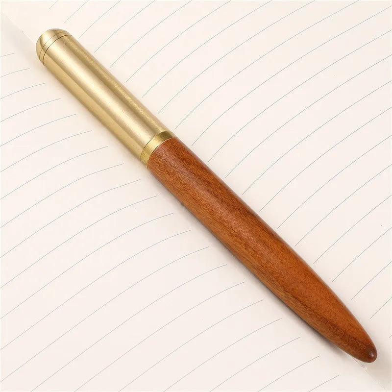 Business fountain pen with stainless steel nib and wooden body in rosewood finish on white background