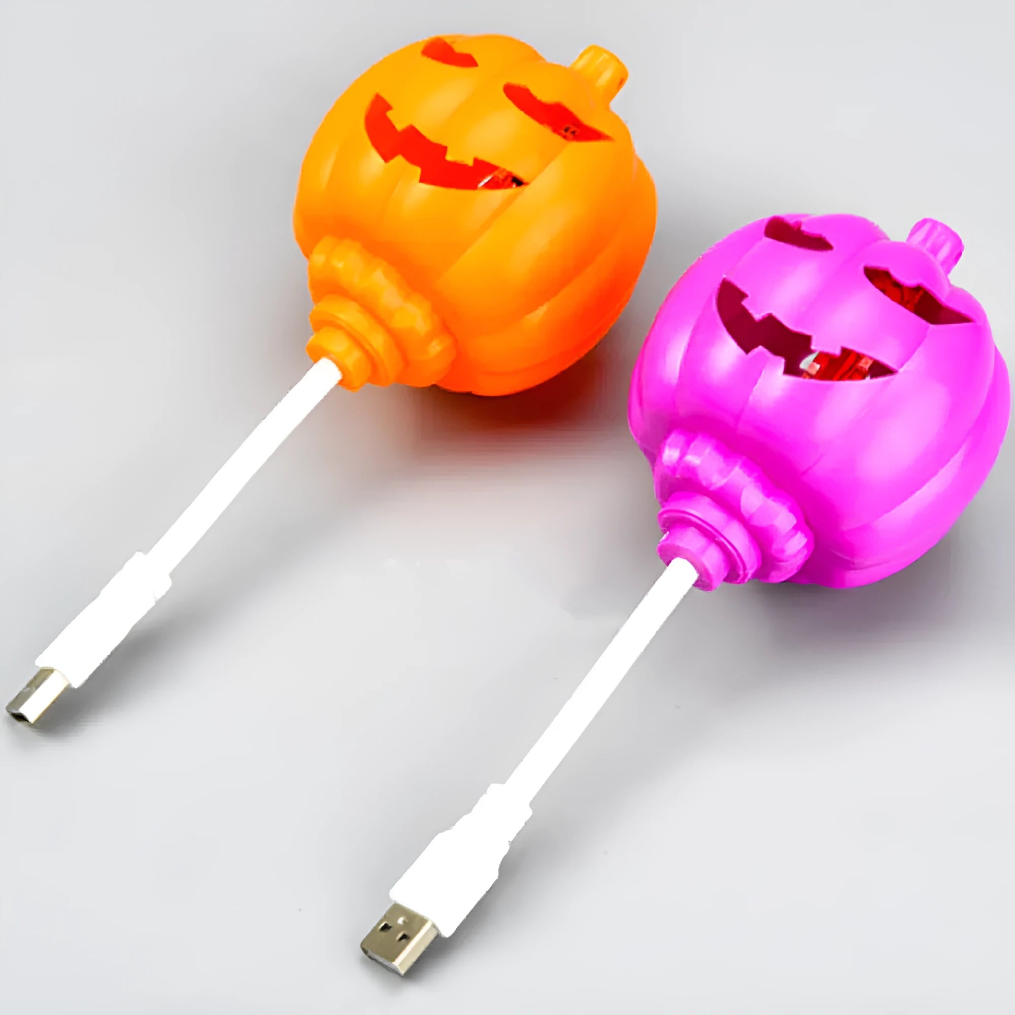 Plastic pumpkin decorative lamp with USB charging port in yellow or purple light options