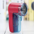 Portable electric clothing lint remover device with compact design for sweater maintenance