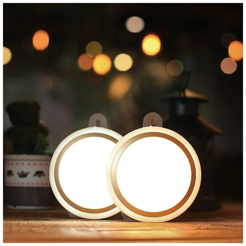 Circular white motion sensor LED light unit showing five LEDs, 80mm in diameter.