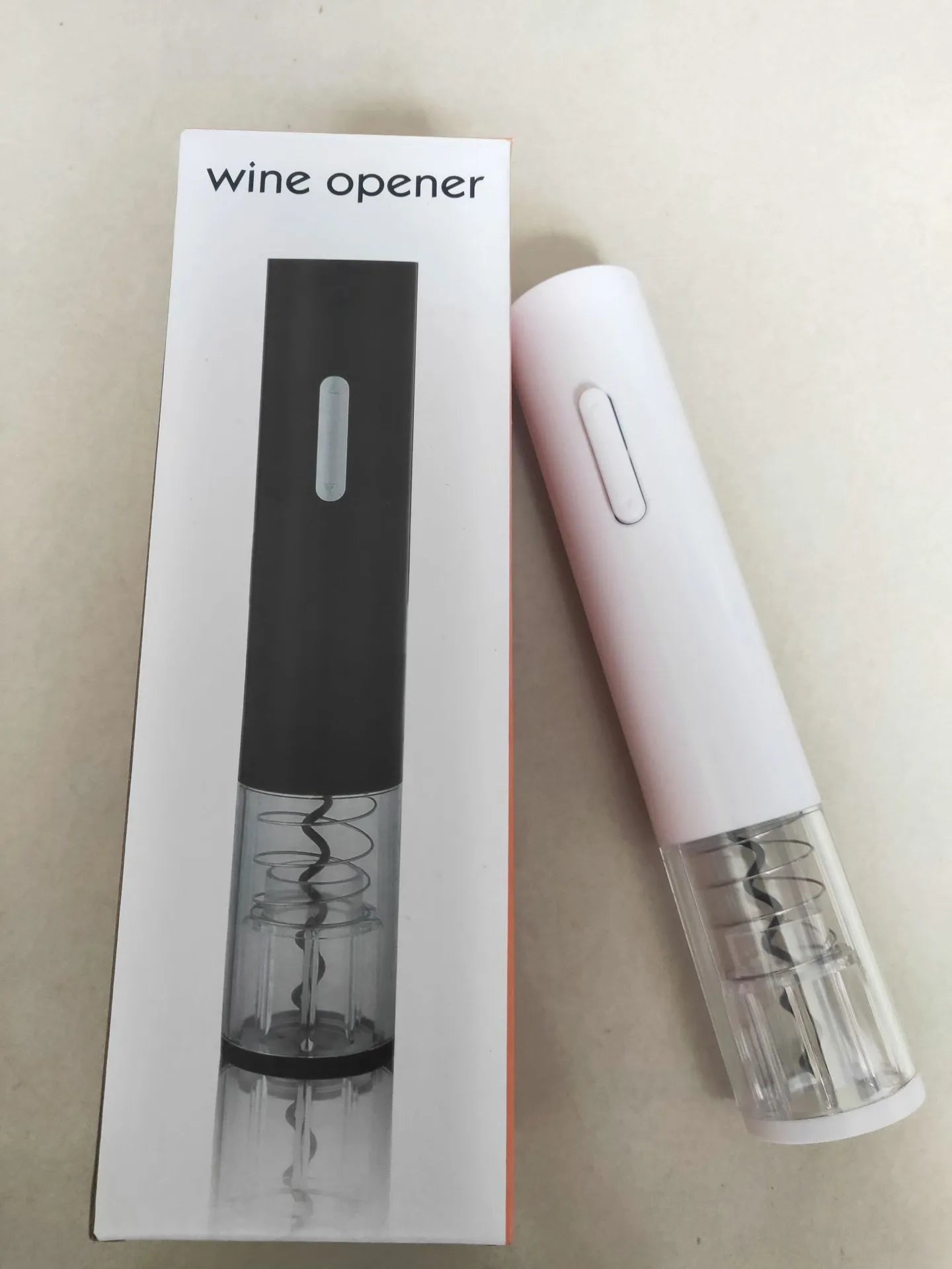 Electric wine opener with foil cutter in red, black and white colour options showing compact design