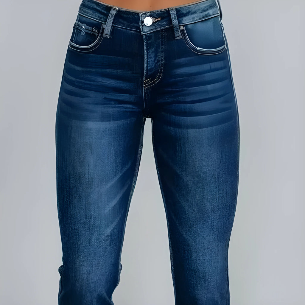 Women's solid blue denim trousers with a casual, hand-worn finish on a hanger.