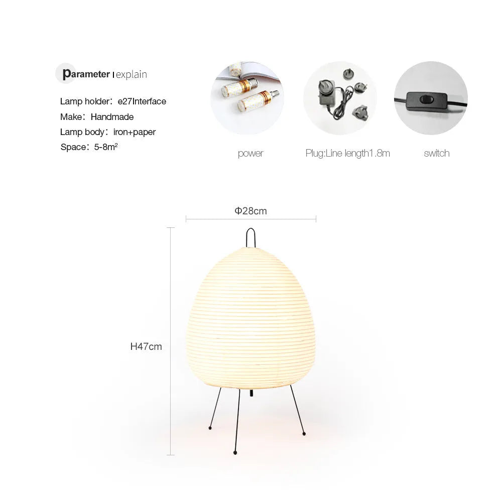 Japanese-style paper table lamp with handmade shade and aluminium base on wooden surface