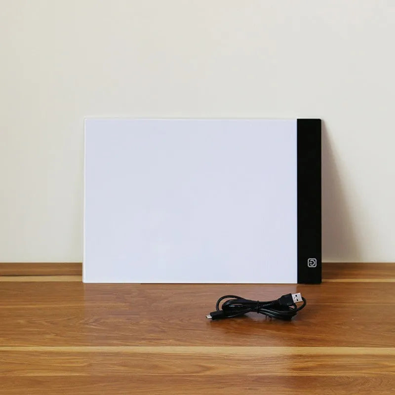 LED artist tracing table with A4 acrylic screen, USB dimming, and touch switch on a desk