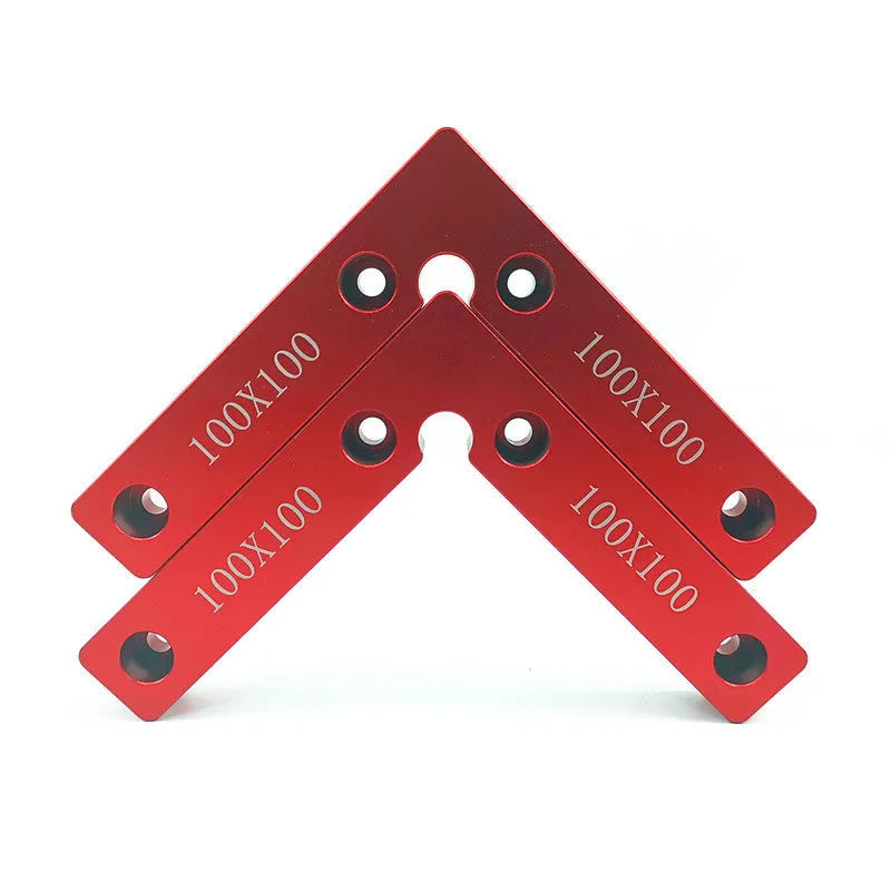 Aluminium woodworking right angle positioning block with scale, shown next to a jigsaw.