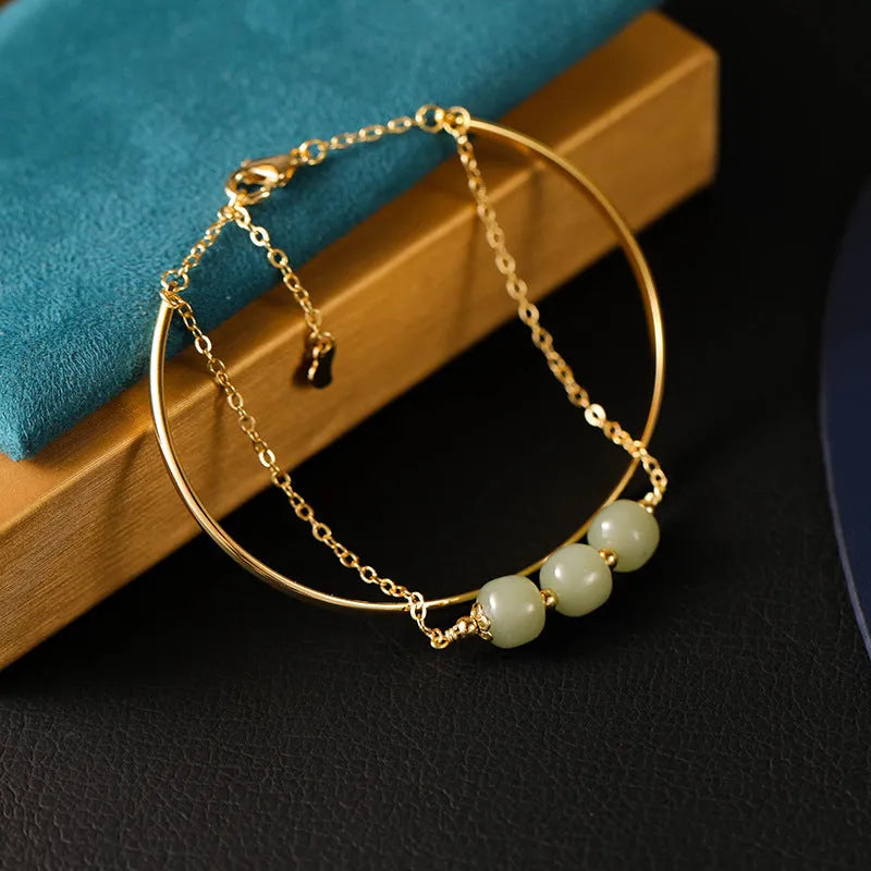 Women's jade lucky beads bracelet with gold inlay decoration in single, double and three beads versions