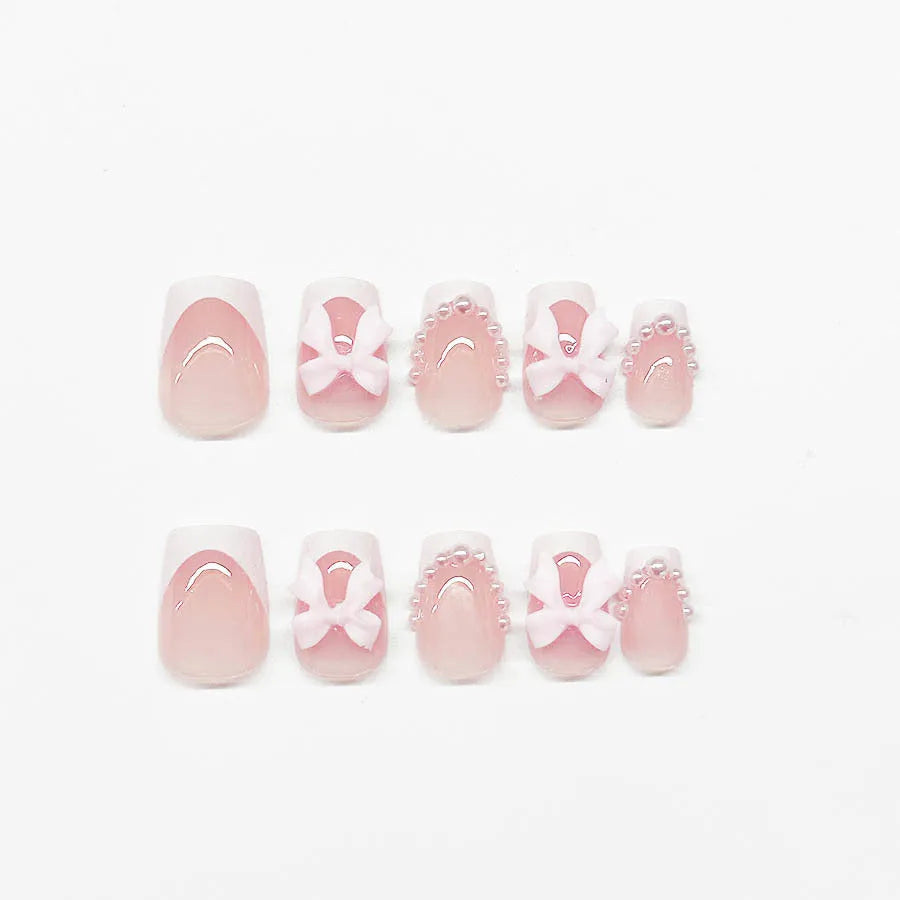 Short French manicure nail art set with multiple patterns including tulip, bow, starry sky and leopard print designs