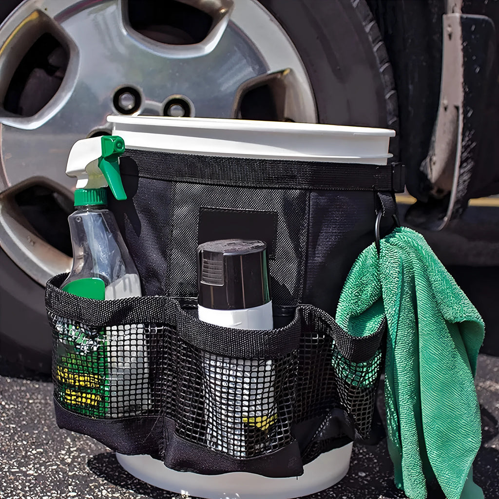 Black polyester hanging storage bag designed for a 5-gallon barrel, showing cylindrical shape.