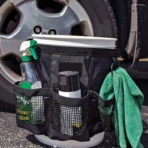 Black polyester hanging storage bag designed for a 5-gallon barrel, showing cylindrical shape.