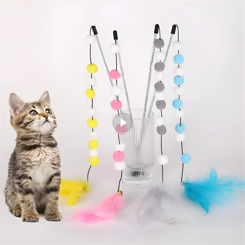 Colourful cat teaser stick with acrylic pompons and feather attachments measuring 31cm long