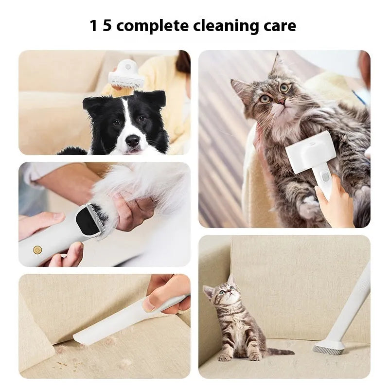 Pink and white pet grooming vacuum cleaner with hair clipper attachment and accessories on a white background.