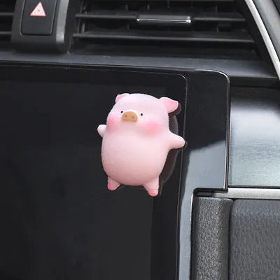 Cartoon pig character resin car ornament for dashboard or windscreen decoration.