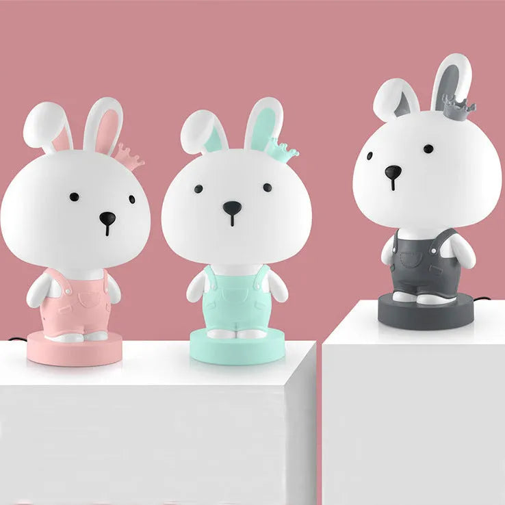 Cartoon animal table lamp with LED lighting and plastic shade in random bear, cattle, rabbit, or tiger designs