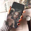 Transparent matte iPhone case with printed XXxtentacion design, shown fitted on a smartphone.