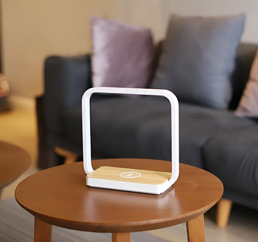 White plastic touch control LED lamp compatible with iPhone on a nightstand