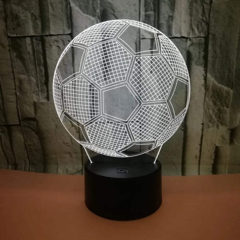 3D football-shaped night light with colourful LED illumination on an ABS base.
