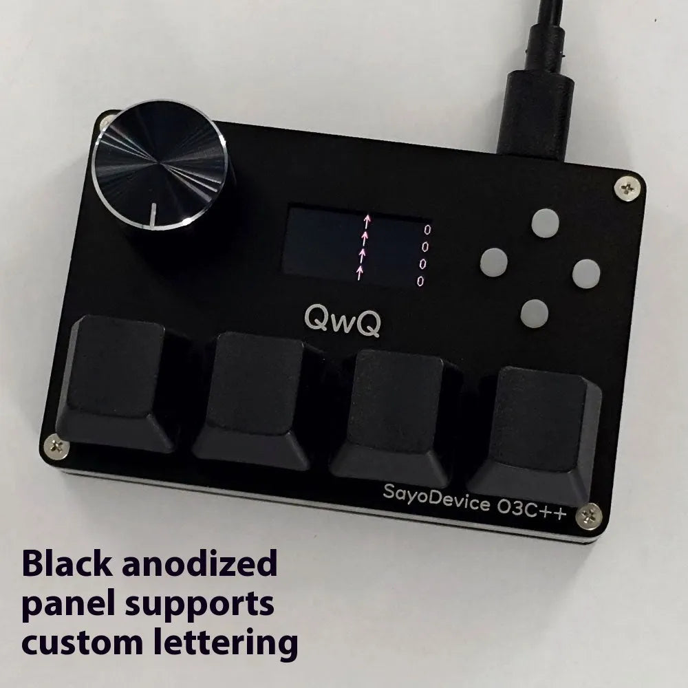 Customisable magnetic axis gaming keypad with programmable knob and colour IPS screen on desk.