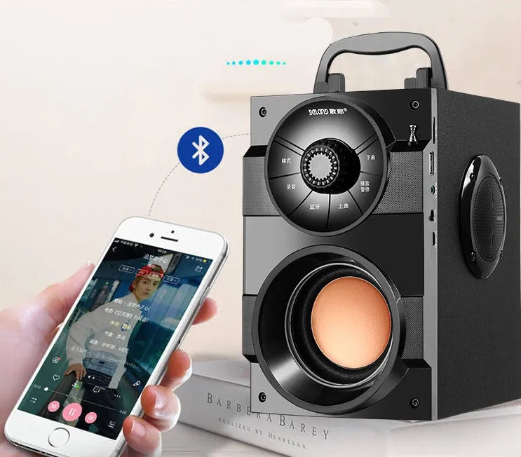 Black portable mini audio system with subwoofer, USB power cable and 3.5mm audio connection