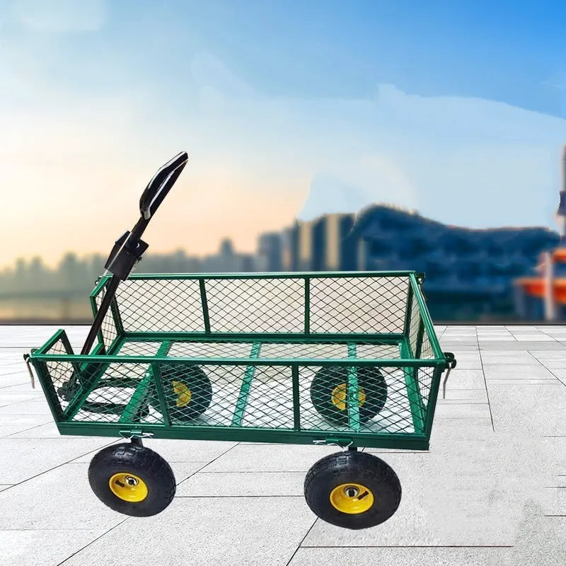 Green four-wheel hand push net cart with iron frame and rubber wheels on outdoor ground