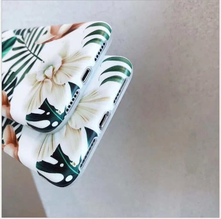Floral banana leaf art design on a soft TPU phone case for iPhone models.