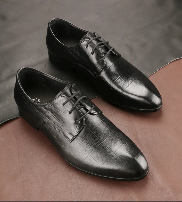 Men's black leather Derby shoes with checkered pattern detailing and pointed toe caps