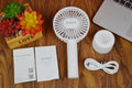 ORICO FH1 white portable USB rechargeable fan with adjustable speed settings and handheld design