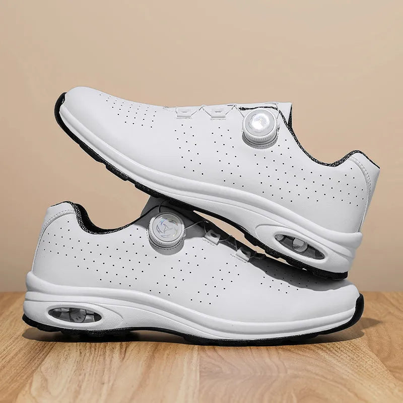 Men's black and white low-top mesh casual tennis shoes with cross straps and lace-up front
