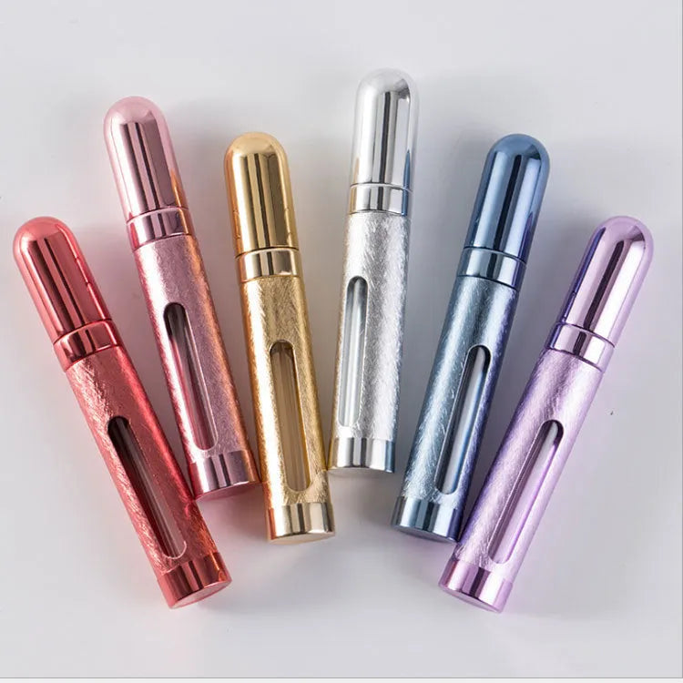 12ml aluminium portable perfume bottle in bullet shape with glass liner, shown in six colour options.