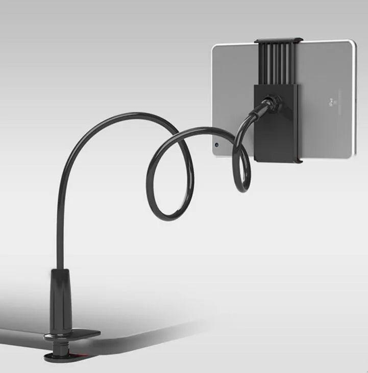 Black bedside phone holder with a long metal arm and adjustable plastic head gripping a mobile phone.