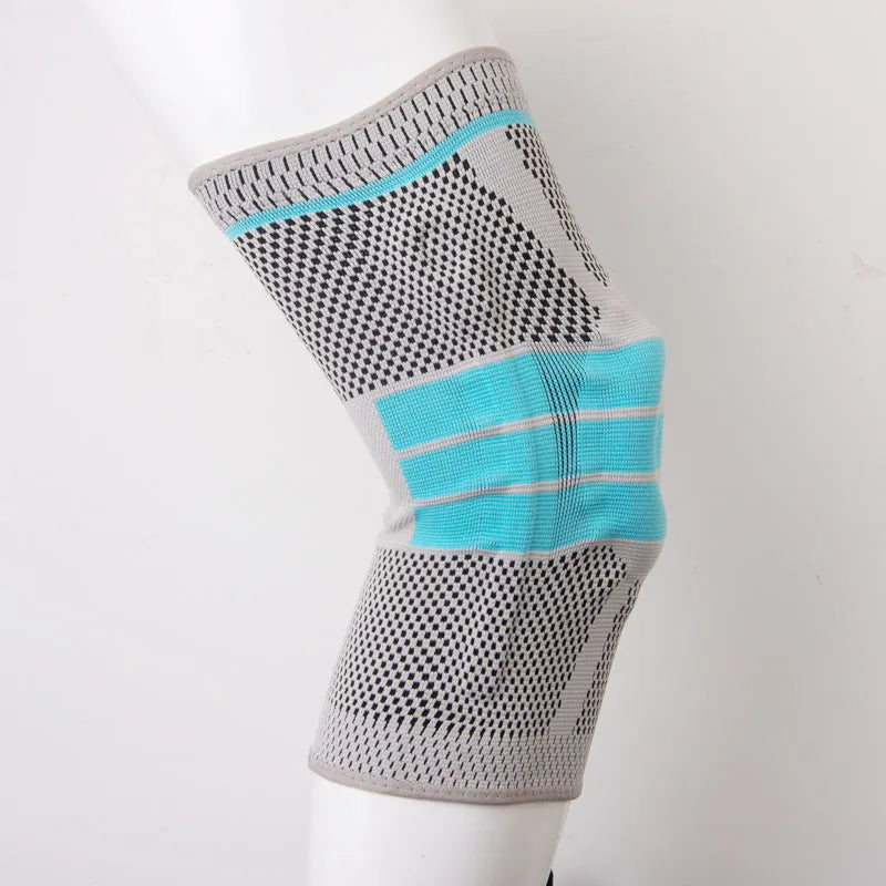Sky blue elastic fibre knee pad with silicone protection for sports.