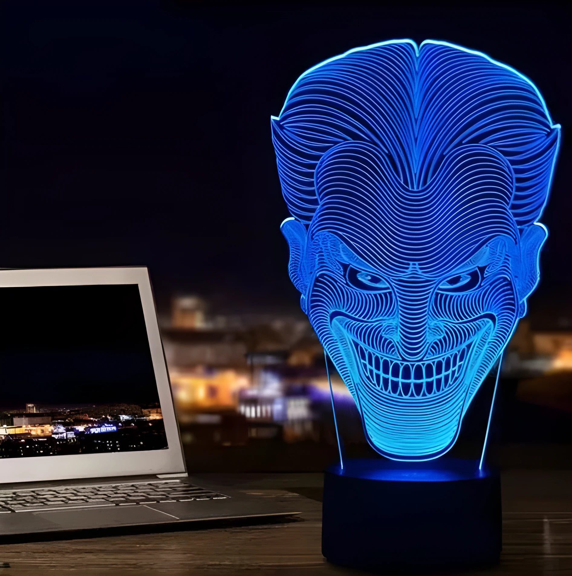 USB-powered 3D acrylic LED lamp showing colourful gradient illumination on a desk.
