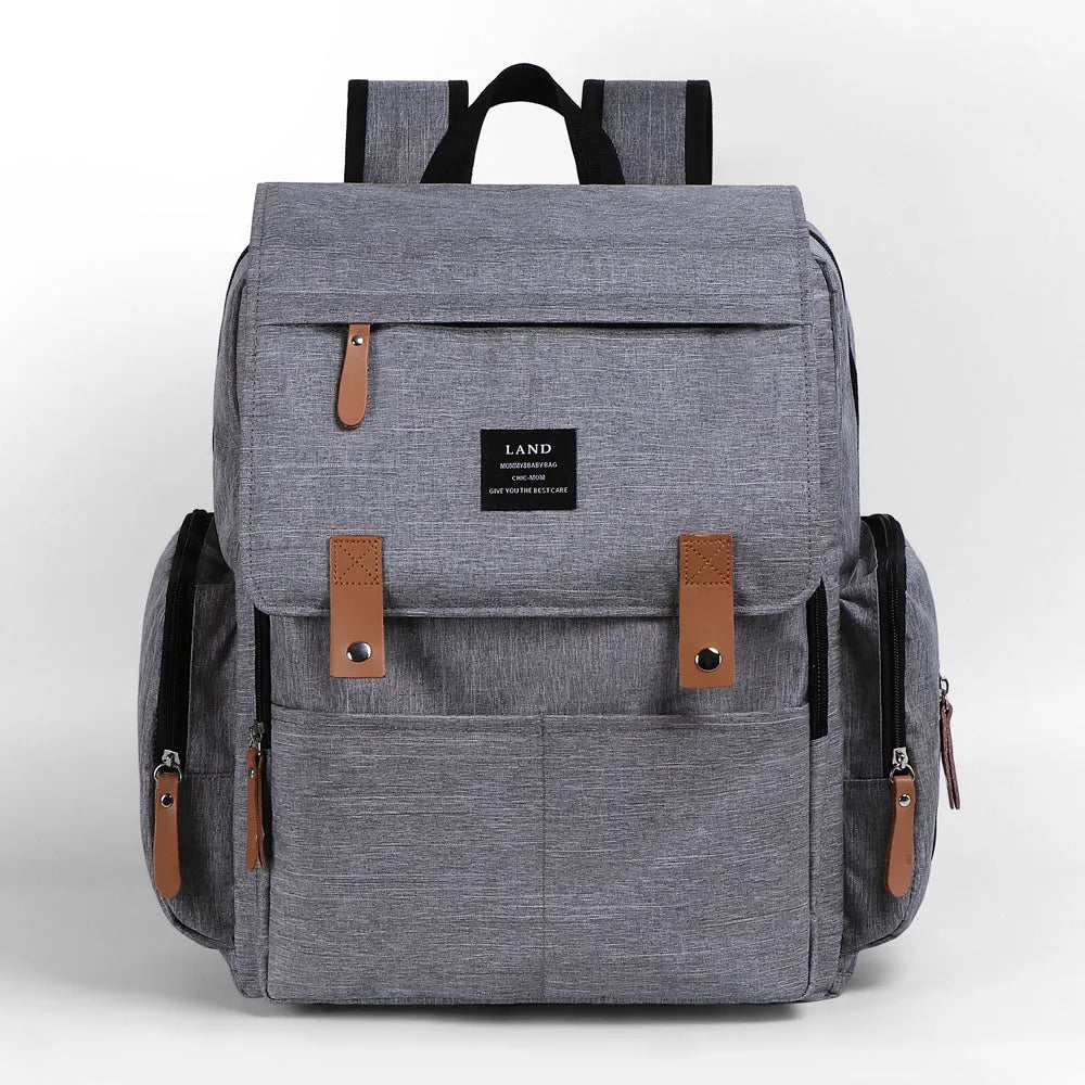 LAND Mommy large oxford cloth diaper backpack with changing mat, shown in grey colour.