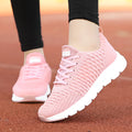 Women's running shoes with fly-weave upper in black, pink and white colour options