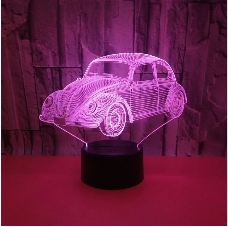 Small modern table lamp with colourful LED light in an acrylic shade on a black ABS base.