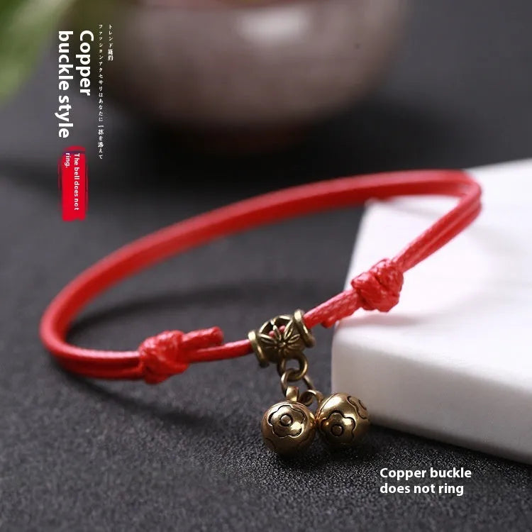 Adjustable nylon dog collar with brass bell for small dogs in black, red, or coffee colours