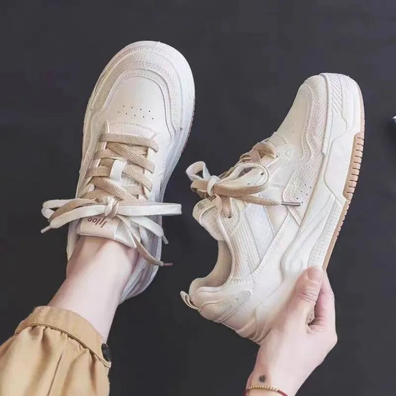 Women's low-top rubber sole sneakers in pink and white with height increase function