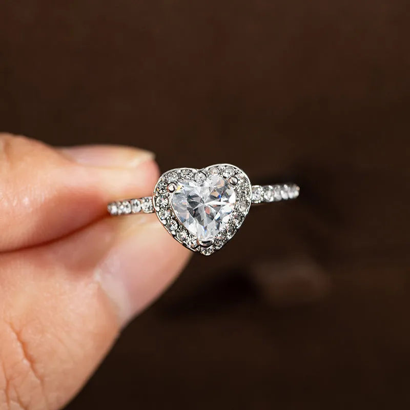 Women's heart-shaped crystal wedding ring with electroplated rose gold finish on white copper